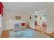 Inviting living room with hardwood floors, a cozy seating area, and a view into the Gathering room at 6245 Hampton Ridge Rd, Raleigh, NC 27603