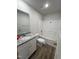 Bathroom with a granite countertop vanity and a tub-shower combination at 63 Coharie Dr, Lillington, NC 27546