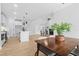 Open floor plan featuring a combined kitchen, living and dining space filled with natural light at 648 Shawnee Dr, Louisburg, NC 27549