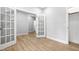 The office boasts wood floors and multiple doors allowing natural light to fill the space at 648 Shawnee Dr, Louisburg, NC 27549