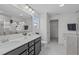 Primary bathroom featuring double vanity, a bathtub and an enclosed toilet at 76 Arlie Ln, Lillington, NC 27546