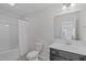 Neutral bathroom with tub-shower combo and single vanity at 76 Arlie Ln, Lillington, NC 27546