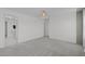 Spacious bedroom with neutral paint, carpeting, and a modern light fixture at 76 Arlie Ln, Lillington, NC 27546