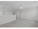 Spacious bonus room area with plush carpet and neutral paint at 76 Arlie Ln, Lillington, NC 27546