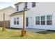 Home exterior featuring a fenced-in yard and a patio area with string lights at 76 Arlie Ln, Lillington, NC 27546