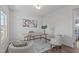 Bright home office with a desk, chairs, hardwood flooring, and a window offering natural light at 76 Arlie Ln, Lillington, NC 27546