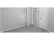 Neutral bedroom featuring plush carpet, and a doorway leading into another room at 804 Harper Rd, Hillsborough, NC 27278