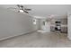 Open-concept living space featuring modern light gray walls and sleek flooring at 804 Harper Rd, Hillsborough, NC 27278