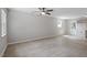 Spacious living room showcasing natural light and contemporary flooring at 804 Harper Rd, Hillsborough, NC 27278