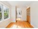 Bright dining area features hardwood floors, large window and natural light, and charming glass paneled door at 804 Old Mill Rd, Chapel Hill, NC 27514