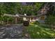 Beautiful home exterior with manicured landscaping and inviting driveway at 804 Old Mill Rd, Chapel Hill, NC 27514