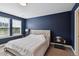Comfortable bedroom features a neutral color scheme and lots of natural light at 805 Winter Meadow Dr, Wake Forest, NC 27587
