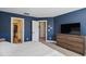 This bedroom has great closet space and also features a wooden dresser with a TV at 805 Winter Meadow Dr, Wake Forest, NC 27587