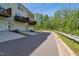Exterior view of townhomes with attached garages and private balconies at 805 Winter Meadow Dr, Wake Forest, NC 27587
