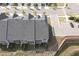 Aerial view of the townhome community with its well maintained landscaping and ample parking at 8426 Garnet Rose Ln, Raleigh, NC 27615