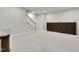 Large finished basement with a staircase, carpet, and neutral paint is ready for fun! at 8426 Garnet Rose Ln, Raleigh, NC 27615
