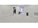 Spacious basement area with gray carpet and neutral paint; ready to be customized to your needs at 8426 Garnet Rose Ln, Raleigh, NC 27615