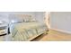 Serene bedroom featuring a comfortable bed, soft lighting, and a calming atmosphere at 8426 Garnet Rose Ln, Raleigh, NC 27615