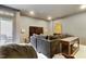 Living room with plush sofa and entertainment system; perfect for cozy nights and gatherings at 8426 Garnet Rose Ln, Raleigh, NC 27615