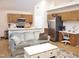 Open floor plan showcasing the living room connected to the kitchen with a built-in desk area at 8712 Attingham Dr, Raleigh, NC 27615