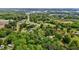 Aerial view showcases a residential area with homes among verdant trees at 901D Gibson Rd, Mebane, NC 27302