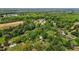 Aerial view of the home site surrounded by trees and neighborhood at 901D Gibson Rd, Mebane, NC 27302
