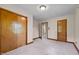 Spacious bedroom with plenty of closet space, neutral carpet and adjacent full bathroom at 901D Gibson Rd, Mebane, NC 27302