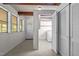 Mud room with tile flooring, laundry closet, and exterior access at 901D Gibson Rd, Mebane, NC 27302