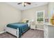 Charming bedroom featuring natural light and a cozy interior at 93 Fallingbrook Dr, Kenly, NC 27542