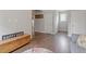 Spacious living area with hardwood floors, and white trim at 101 Jewell Farm Lane, Holly Springs, NC 27540