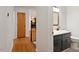 Bathroom featuring a double sink vanity, with access to other areas of the home at 104 Argyle Ct, Garner, NC 27529