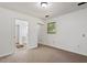 Spacious bedroom with neutral carpet, natural light, and access to a private ensuite bathroom at 104 Argyle Ct, Garner, NC 27529