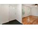 Bright entryway featuring a white front door with windows and hardwood floors at 104 Argyle Ct, Garner, NC 27529