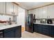 Beautiful kitchen with stainless steel appliances, ample storage, and stylish flooring at 104 Argyle Ct, Garner, NC 27529