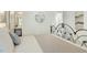 Bedroom view showcasing a decorative bed and adjoining bathroom and walk-in closet at 104 Caley Rd, Apex, NC 27502