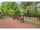 Spacious backyard deck featuring a wood plank surface and direct access to the lawn at 104 Caley Rd, Apex, NC 27502