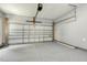 Clean and spacious garage with ample room for parking and storage with overhead door at 104 Caley Rd, Apex, NC 27502
