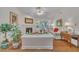 Bright living room with vaulted ceilings, fireplace and hardwood floors at 105 Breakers Pl, Cary, NC 27511