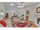 Bright living space offering hardwood floors, a fireplace, and an open concept design at 105 Breakers Pl, Cary, NC 27511