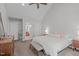 Cozy main bedroom featuring vaulted ceilings, neutral decor, and an attached en-suite bath at 107 Candy Apple Ct, Cary, NC 27513