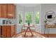 Bright breakfast nook with ample sunlight, perfect for enjoying coffee and outdoor scenery at 107 Candy Apple Ct, Cary, NC 27513