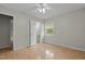 Spacious bedroom with tile flooring, a window, and a ceiling fan at 108 Deepwood Cir, Garner, NC 27529