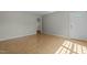 Open-concept living room with tile floors, bathed in natural light at 108 Deepwood Cir, Garner, NC 27529