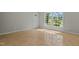 Inviting living room with tile flooring, bathed in sunlight from the large window at 108 Deepwood Cir, Garner, NC 27529