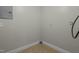 The utilitarian room features a cement baseboard and multiple outlets at 108 Deepwood Cir, Garner, NC 27529