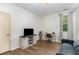 Spare bedroom with space for a desk area, TV, and sofa for relaxing at 1209 Shasta Daisy Dr, Wake Forest, NC 27587