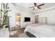 Spacious main bedroom with ensuite bathroom, tray ceilings, and modern furniture at 1209 Shasta Daisy Dr, Wake Forest, NC 27587