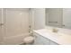 Clean bathroom featuring white fixtures, a tub/shower combo, and a sink with vanity at 127 High Hampton Way, Fuquay Varina, NC 27526