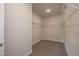 Spacious walk-in closet with ample storage shelves ready for customization at 127 High Hampton Way, Fuquay Varina, NC 27526