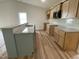 Well-equipped kitchen featuring granite countertops, and stainless steel microwave at 127 Oakfield Trace Dr, Four Oaks, NC 27524